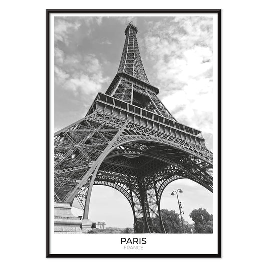 Black and white picture of the Eiffel Tower in Paris featuring its intricate structure by artist poster titled Tour Eiffel Black and White, with black aluminium frame on white background
