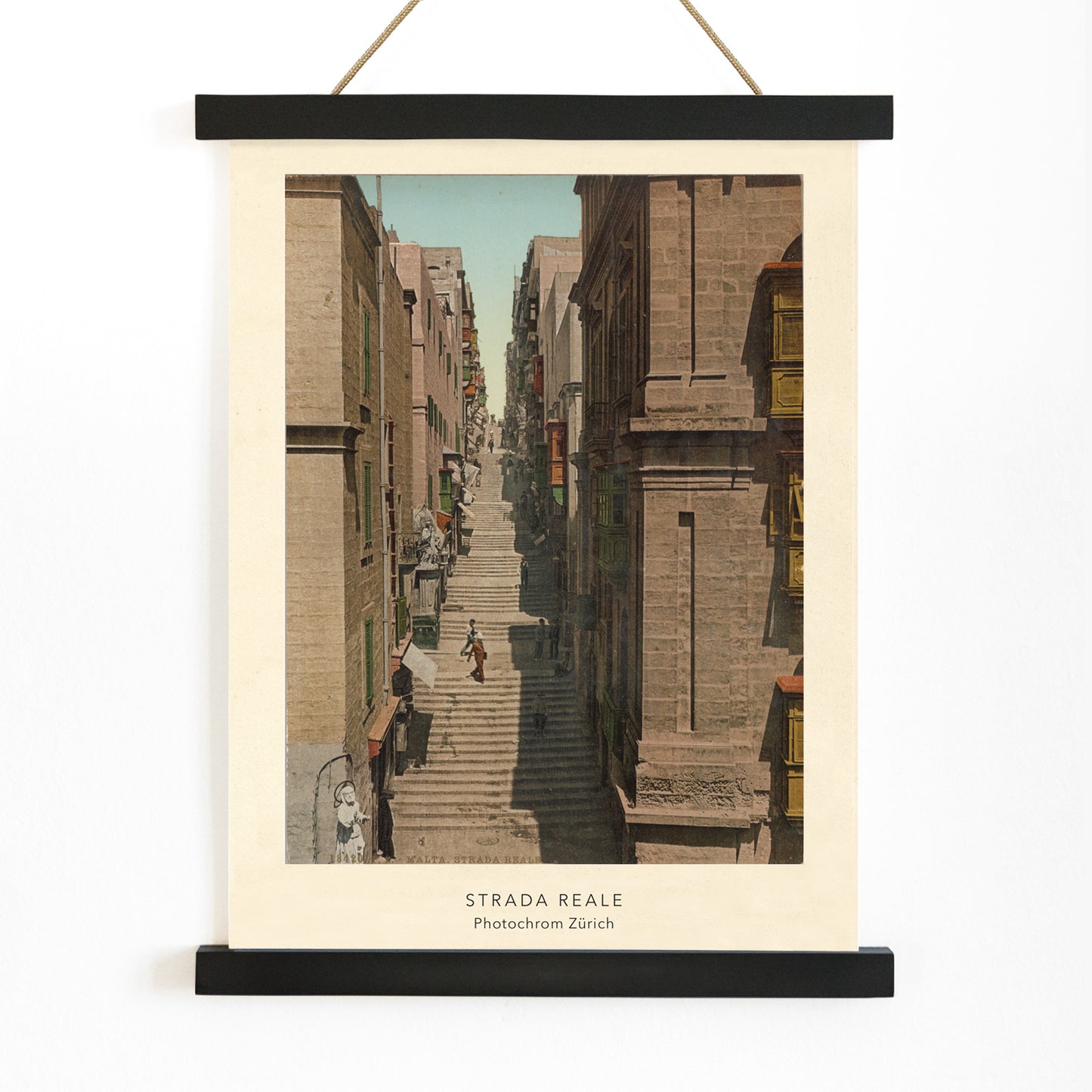 Steep stone staircase and historic street scene with people in Valletta Strada Reale by Photochrom Zurich, with wooden magnetic frame on white background