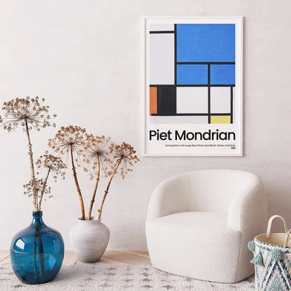 Abstract geometric painting and poster featuring Composition with Large Blue Plane Red Black Yellow and Gray by Piet Mondrian, framed and displayed in home decor