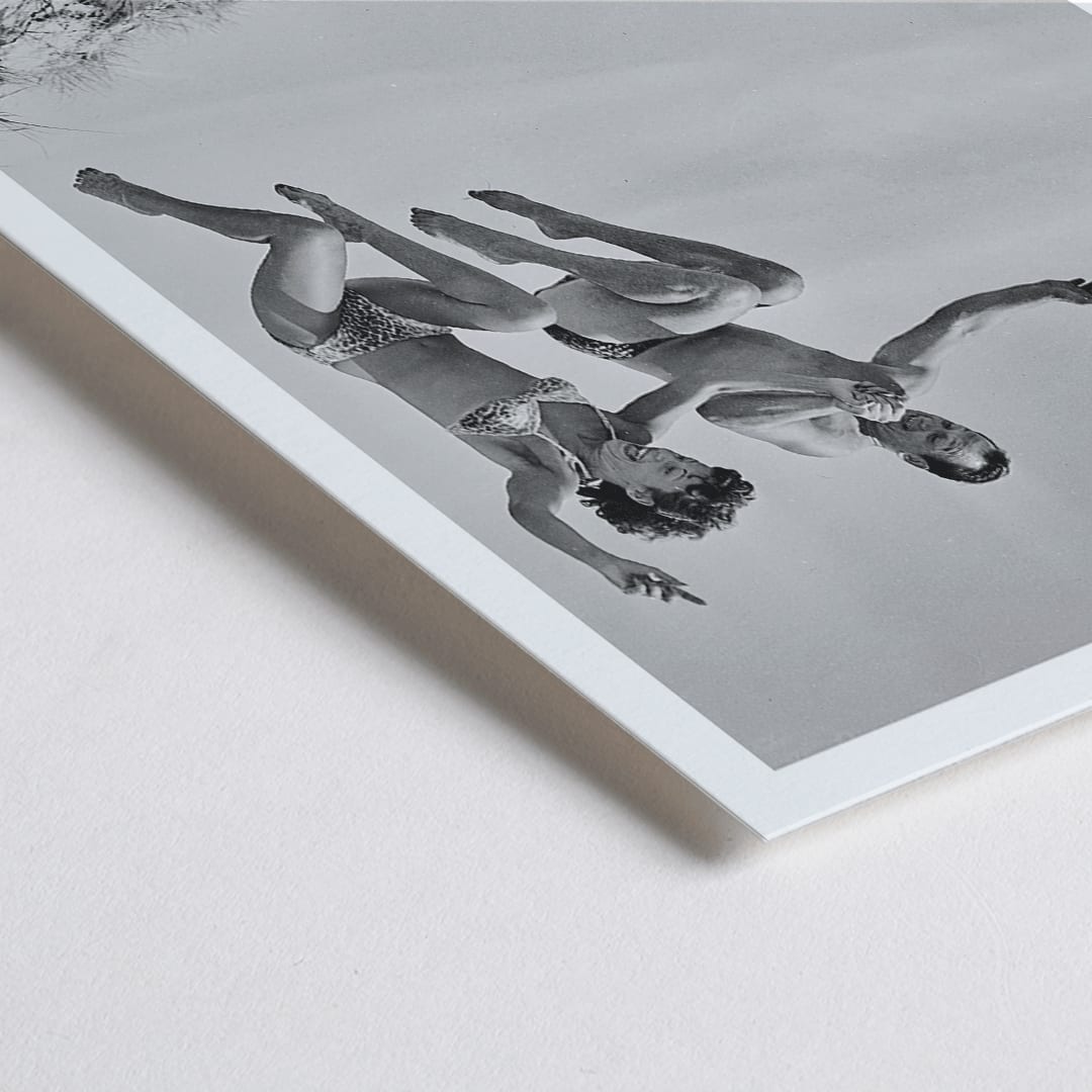 Closeup detail of Two Tivoli Stars performing an acrobatic jump on a sandy beach in swimsuits Acrobatics at the Beach poster