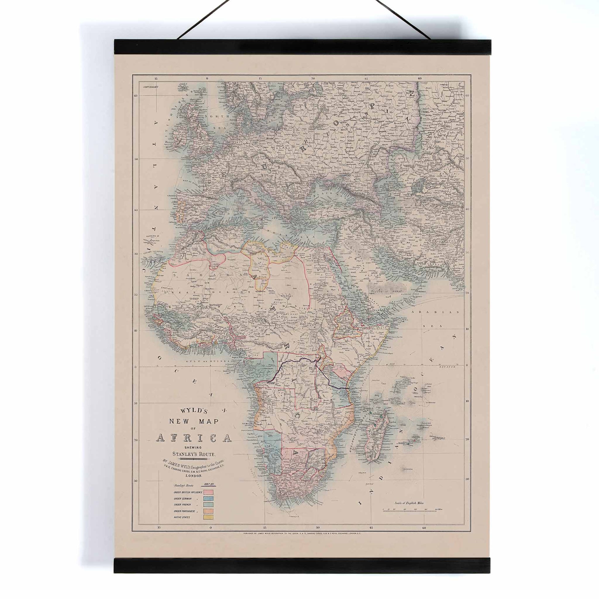 Wyld New Map of Africa vintage cartographic poster in beige grey blue and red tones, with wooden magnetic frame on white background