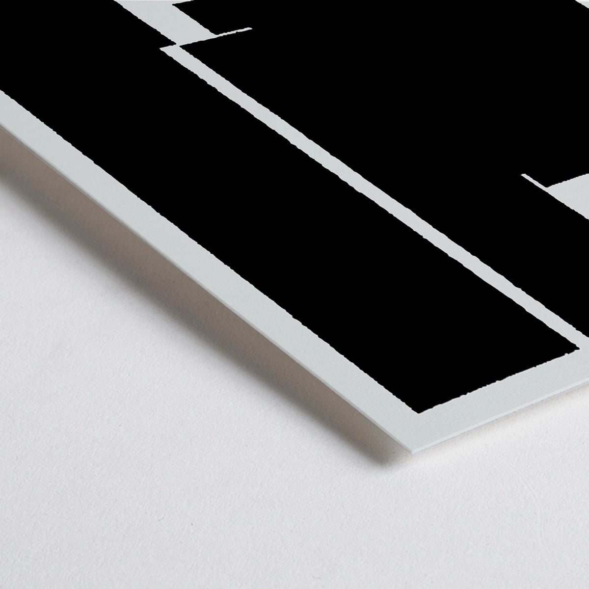 Closeup detail of Black and white geometric abstract Bauhaus artwork by Joost Schmidt and László Moholy-Nagy featuring poster design with abstract shapes