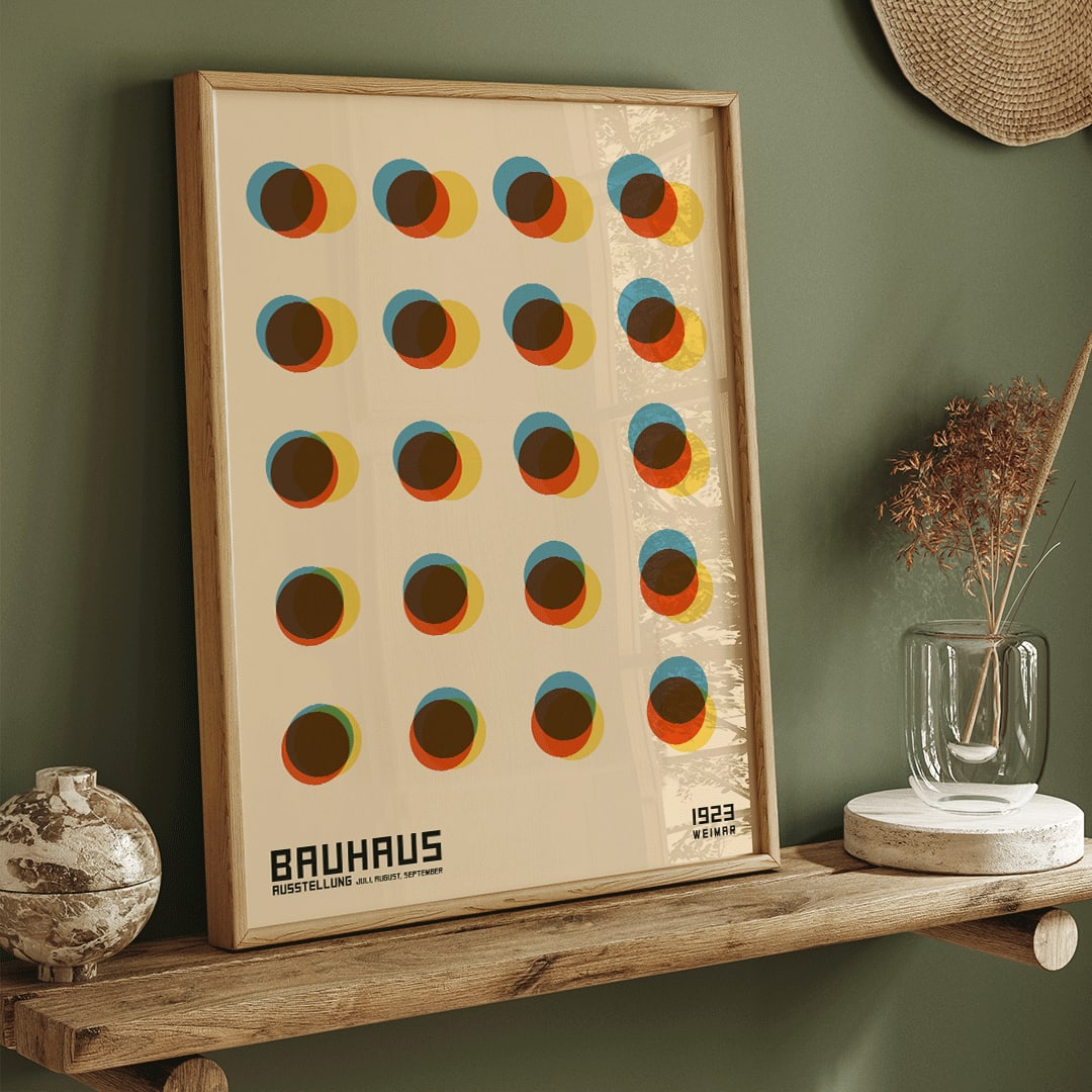 Bauhaus Poster 7 inspired by the 1923 Weimar Exhibition featuring colorful geometric overlapping circles in blue red yellow and brown tones, framed and displayed in home decor