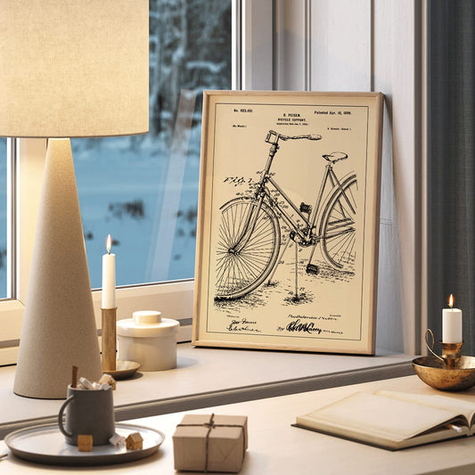 Bicycle support patent by B Peisen with detailed technical drawing and mechanical diagram featuring support stand and annotations, framed and displayed in home decor
