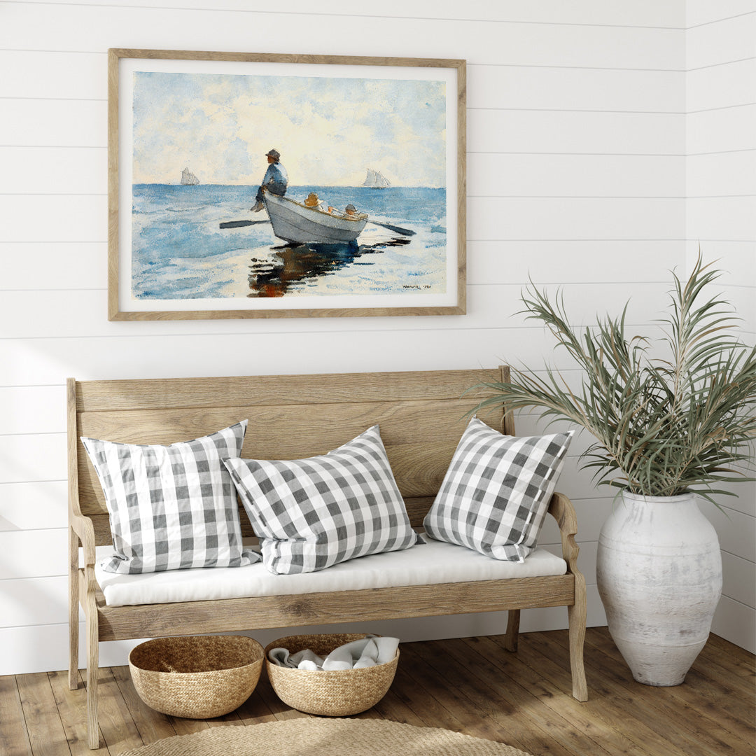 Boys in a Dory by Winslow Homer three boys relaxing in a rowboat on calm blue ocean with distant sailboats, framed and displayed in home decor