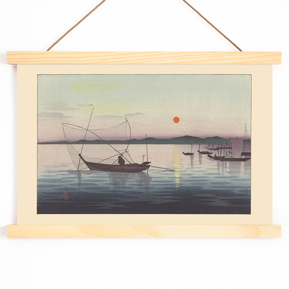 Traditional Japanese boats on calm water at sunset with mountains artwork by Ohara Koson, with wooden magnetic frame on white background