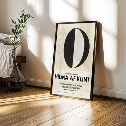 Abstract artwork The Current Standpoint of the Mahatmas by Hilma Af Klint featuring geometric shapes and a black and white abstract circular design poster, framed and displayed in home decor