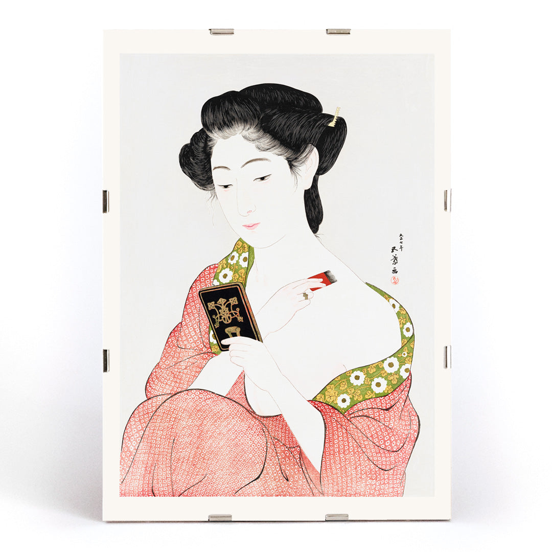 High resolution Japanese art print of a woman in a kimono applying powder by Goyo Hashiguchi titled Woman Applying Powder, framed and displayed in modern living room decor