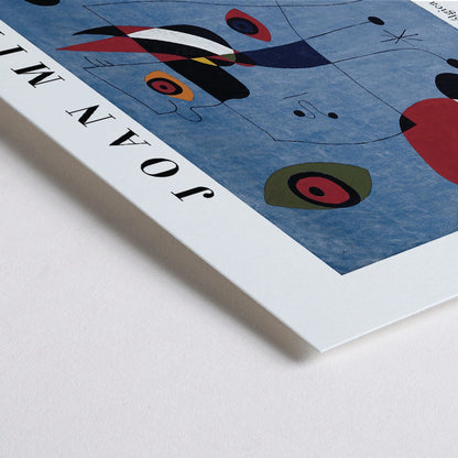 Closeup detail of Exhibition poster of abstract artwork Woman and Bird at Night by Joan Miro with colorful shapes on a blue background