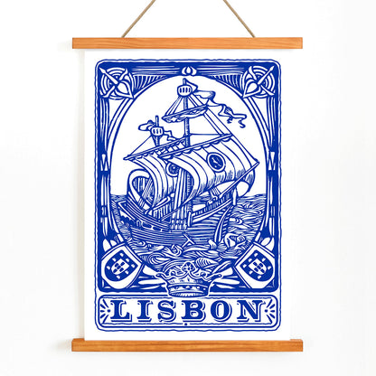 Blue painted azulejo tile artwork by Lisbon Azulejo featuring a ship and the word Lisbon Blue painted tile 1 poster, with wooden magnetic frame on white background