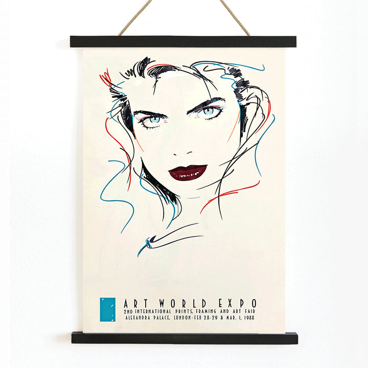 Metropolis Julie female portrait by Dennis Mukai colorful abstract lines bold lips poster at Art World Expo, with wooden magnetic frame on white background