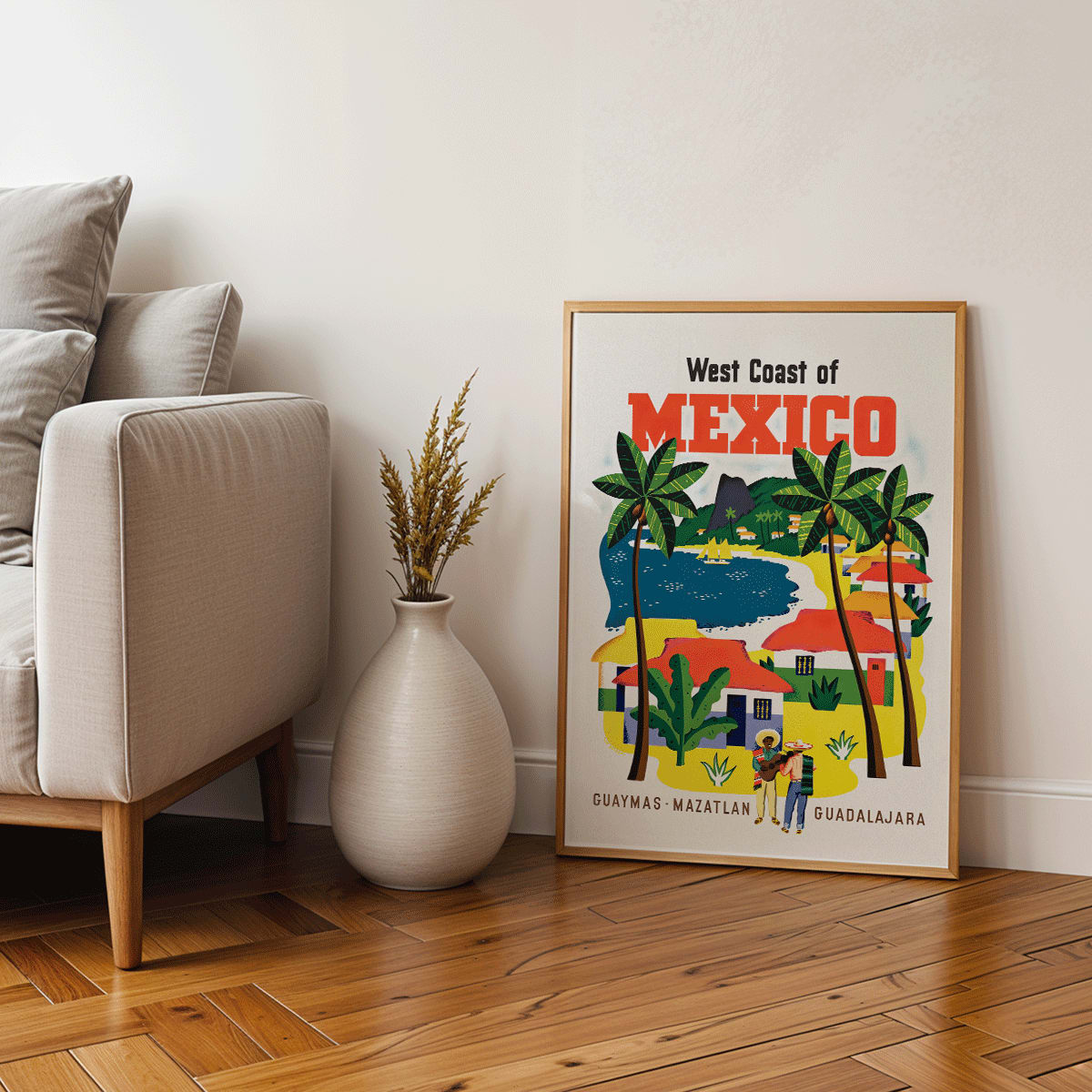 Colorful vintage travel poster of the West Coast of Mexico by Ray Bethers with palm trees and vibrant colorful houses, framed and displayed in home decor