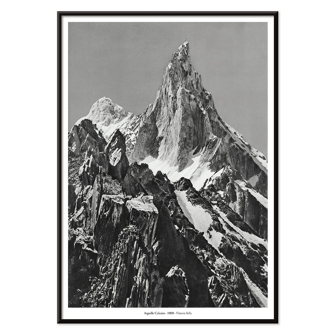 Jagged mountain peak with snow and glaciers by Vittorio Sell Aiguille calcaire Baltoro and Godwin Austen poster photography, with black aluminium frame on white background