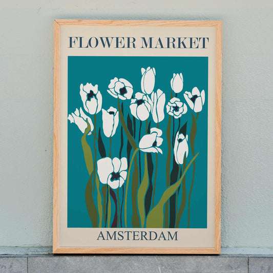 Flower Market Amsterdam artwork by Moryarty featuring white tulips with green stems on a teal and blue background, framed and displayed in home decor