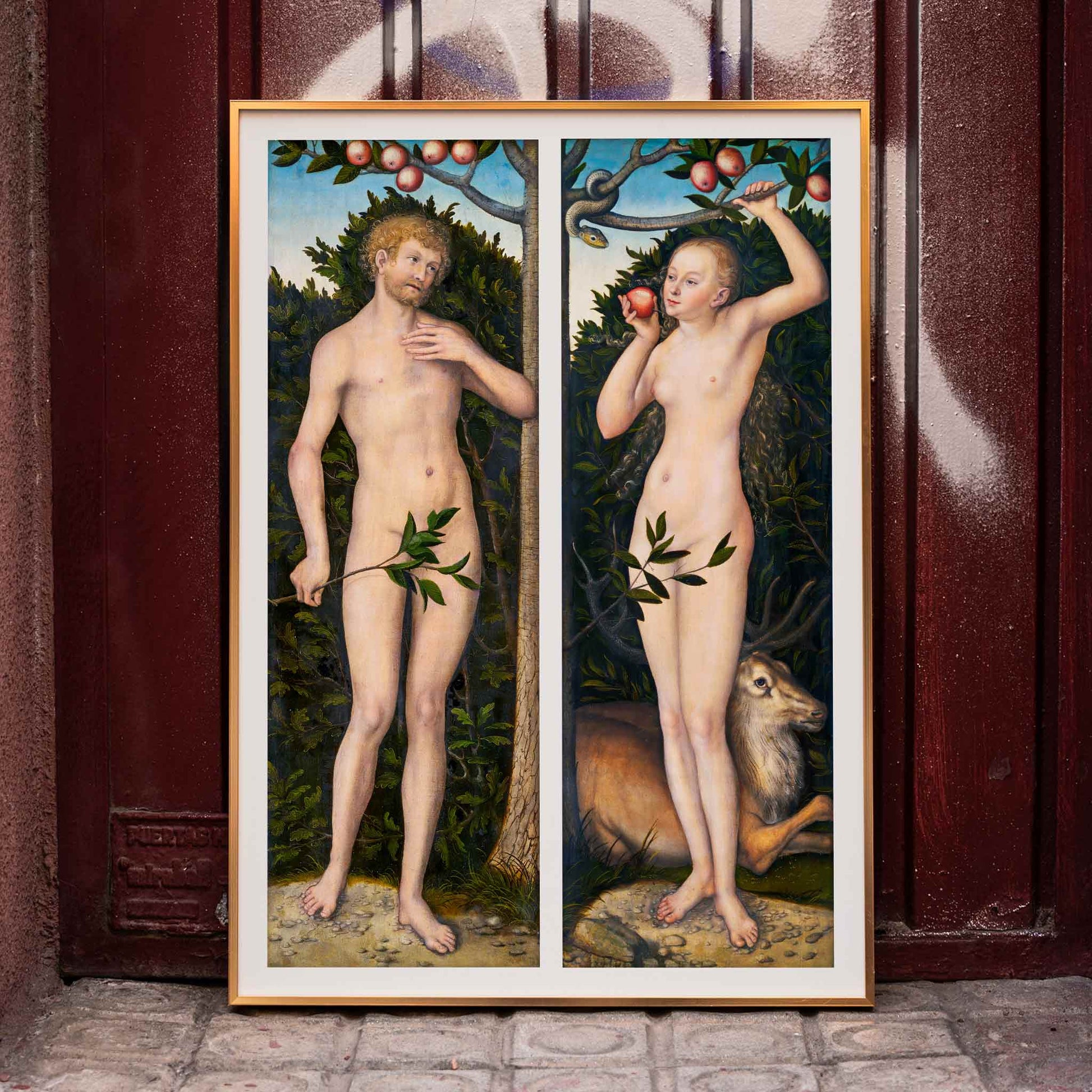 Lucas Cranach Adam and Eve painting in the Garden of Eden with snake apples animals and fruit trees biblical figures, framed and displayed in home decor