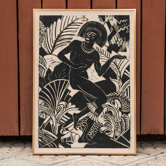 Black and white artwork and poster of a stylized dancing figure among bold jungle plants by Henri van der Stok Jager, framed and displayed in home decor