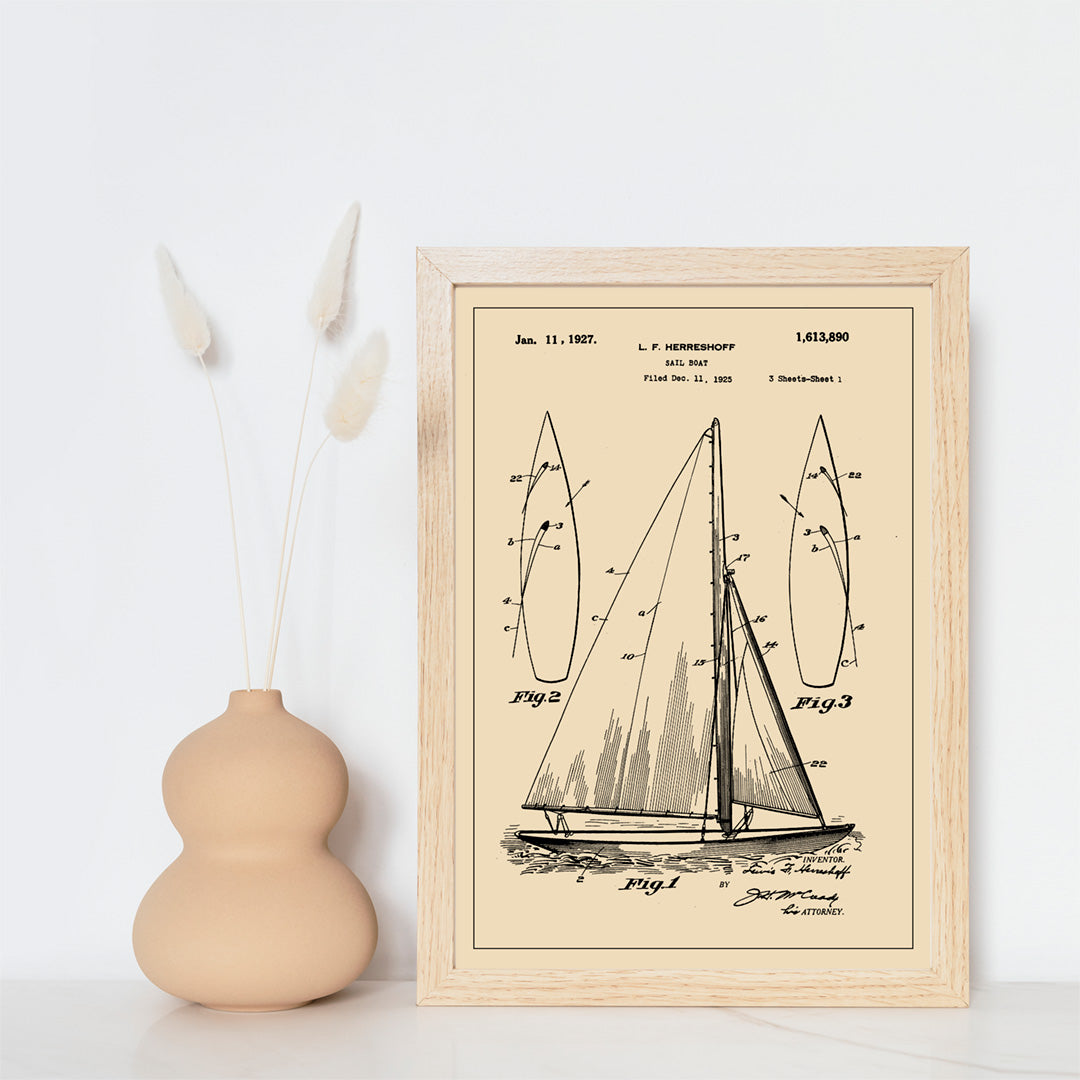 Vintage sailboat patent drawing and poster by L F Herreshoff featuring detailed technical sailboat artwork and schematics, framed and displayed in home decor