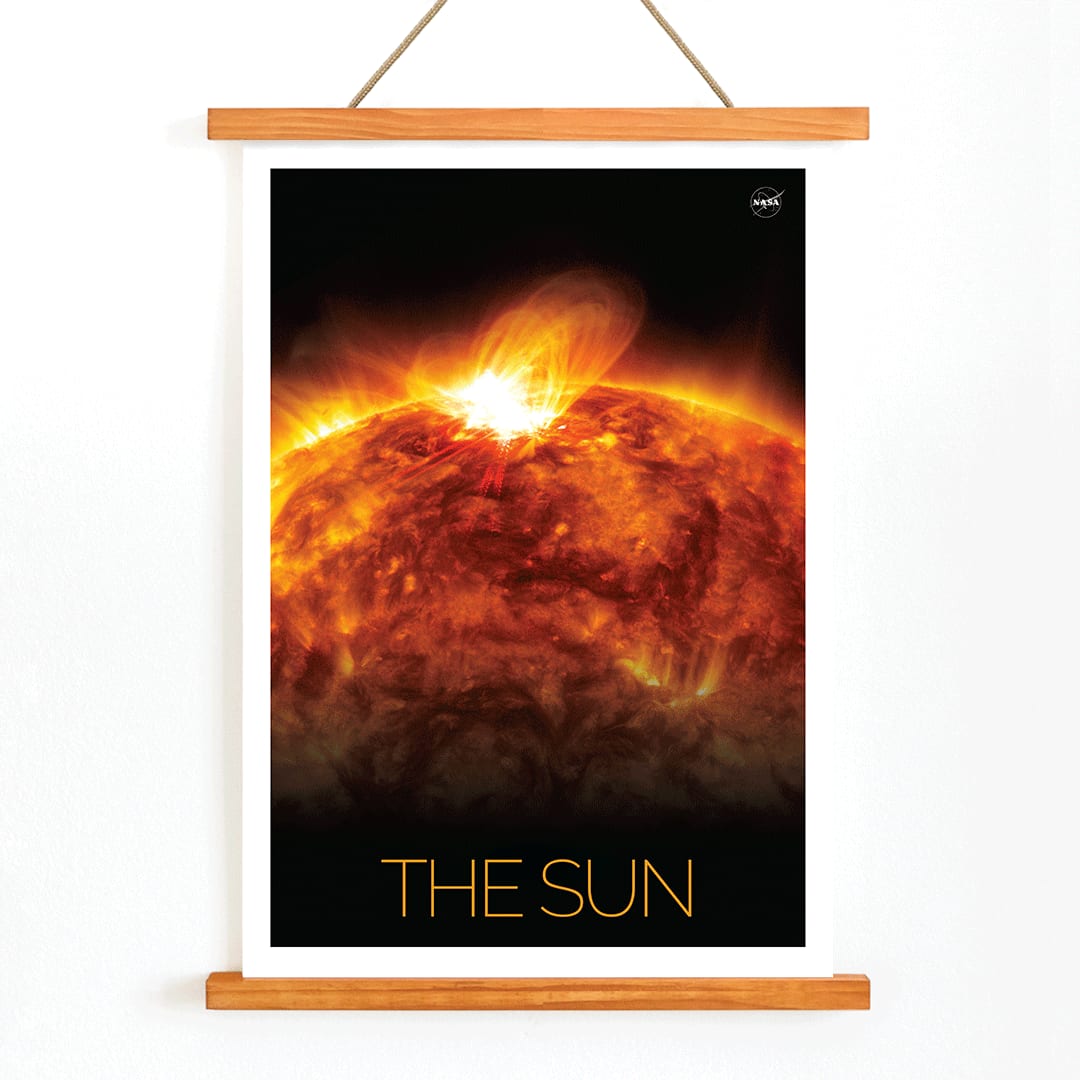 Vibrant NASA artwork of the Sun with solar flares titled The Sun 1 fiery depiction and poster, with wooden magnetic frame on white background