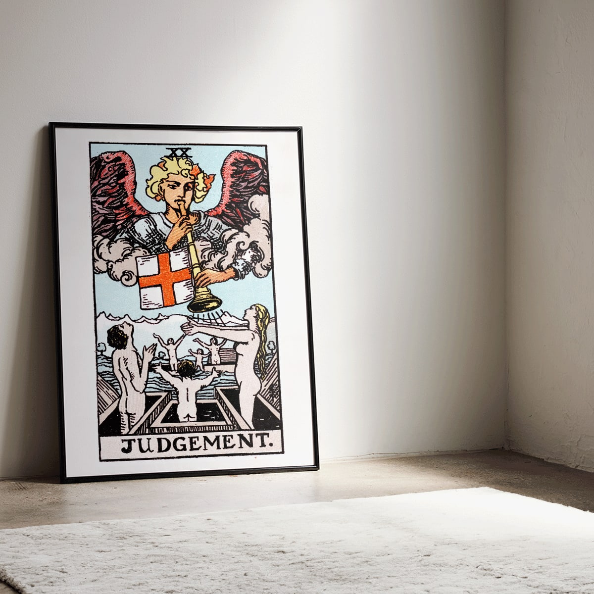 Judgement tarot card by Rider Waite showing an angel with a trumpet and people rising from graves poster, framed and displayed in home decor