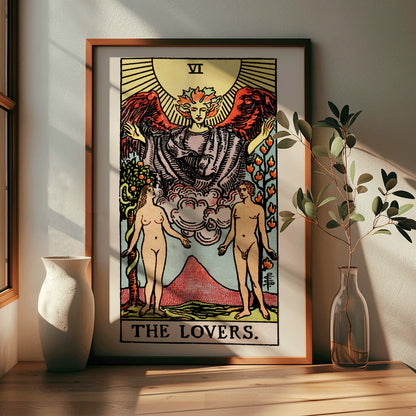 The Lovers Tarot card by Rider Waite featuring a winged angel above a man and woman in a garden illustration and poster, framed and displayed in home decor
