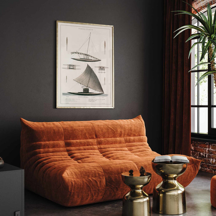 J. Tastu Tonga-Tabou poster with detailed pirogues of chief Palou, rigging studies, and antique nautical drawings in soft grey and beige tones, framed and displayed in modern living room decor