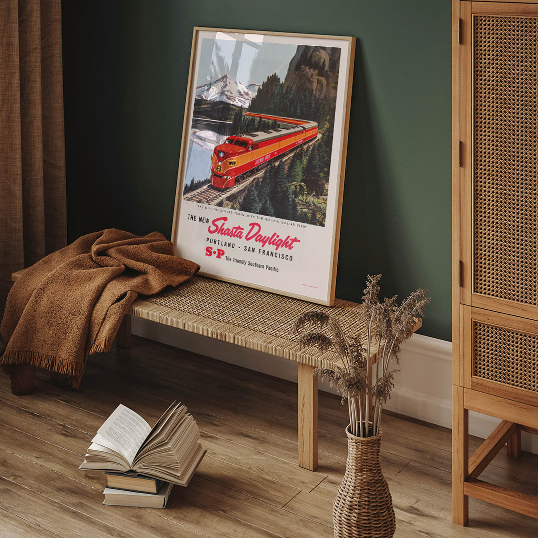 Colorful red train traveling through scenic mountain landscape Shasta Daylight Portland San Francisco vintage artwork poster, framed and displayed in home decor