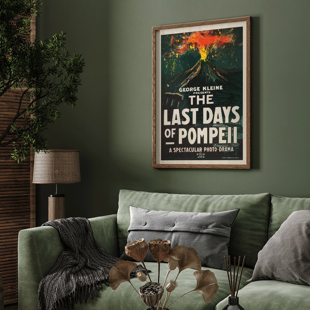 Dramatic volcanic eruption movie poster with bold text for The Last Days of Pompeii by H C Miner Litho Co, framed and displayed in home decor